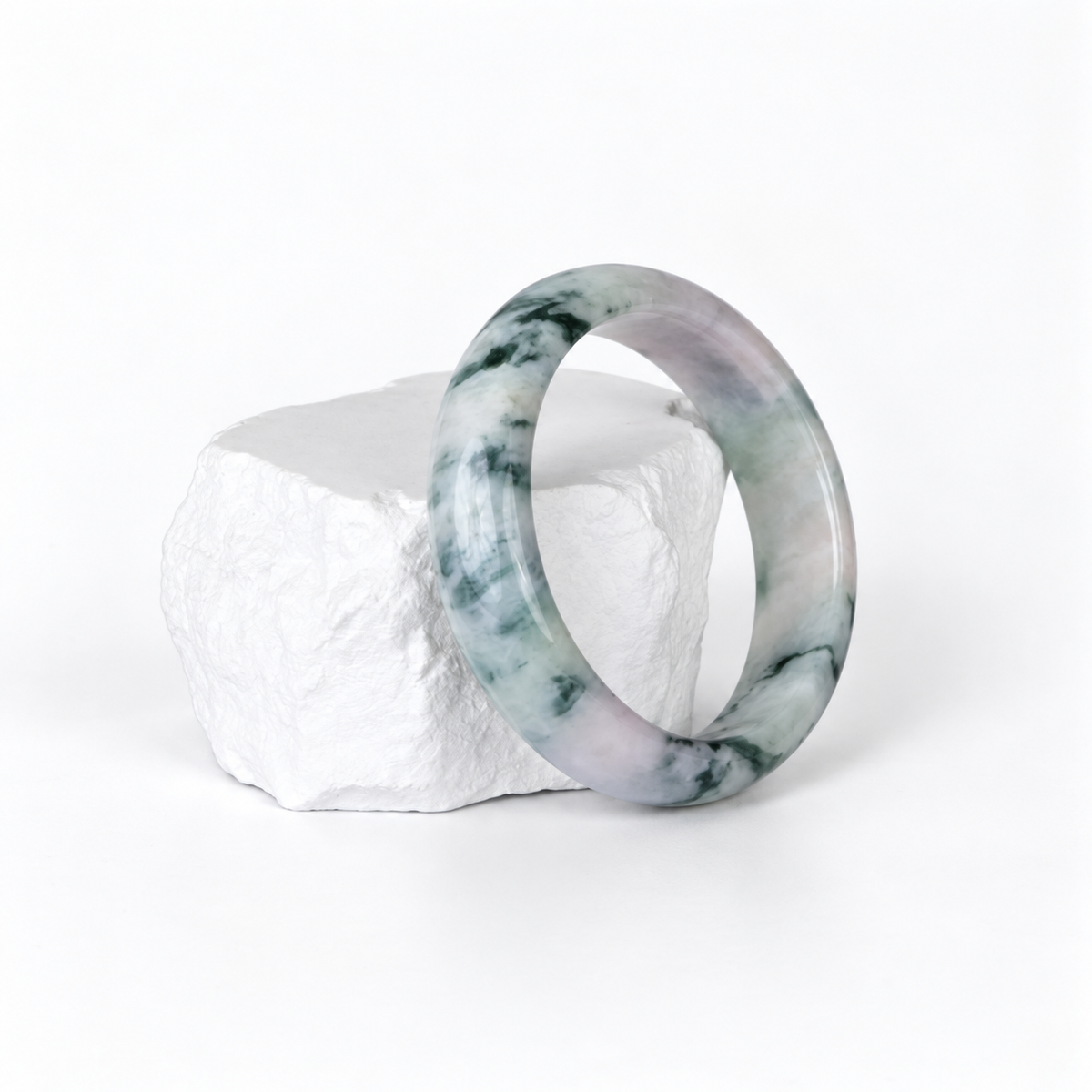 White and green moss-in-snow jadeite bangle from Mandalay Jade