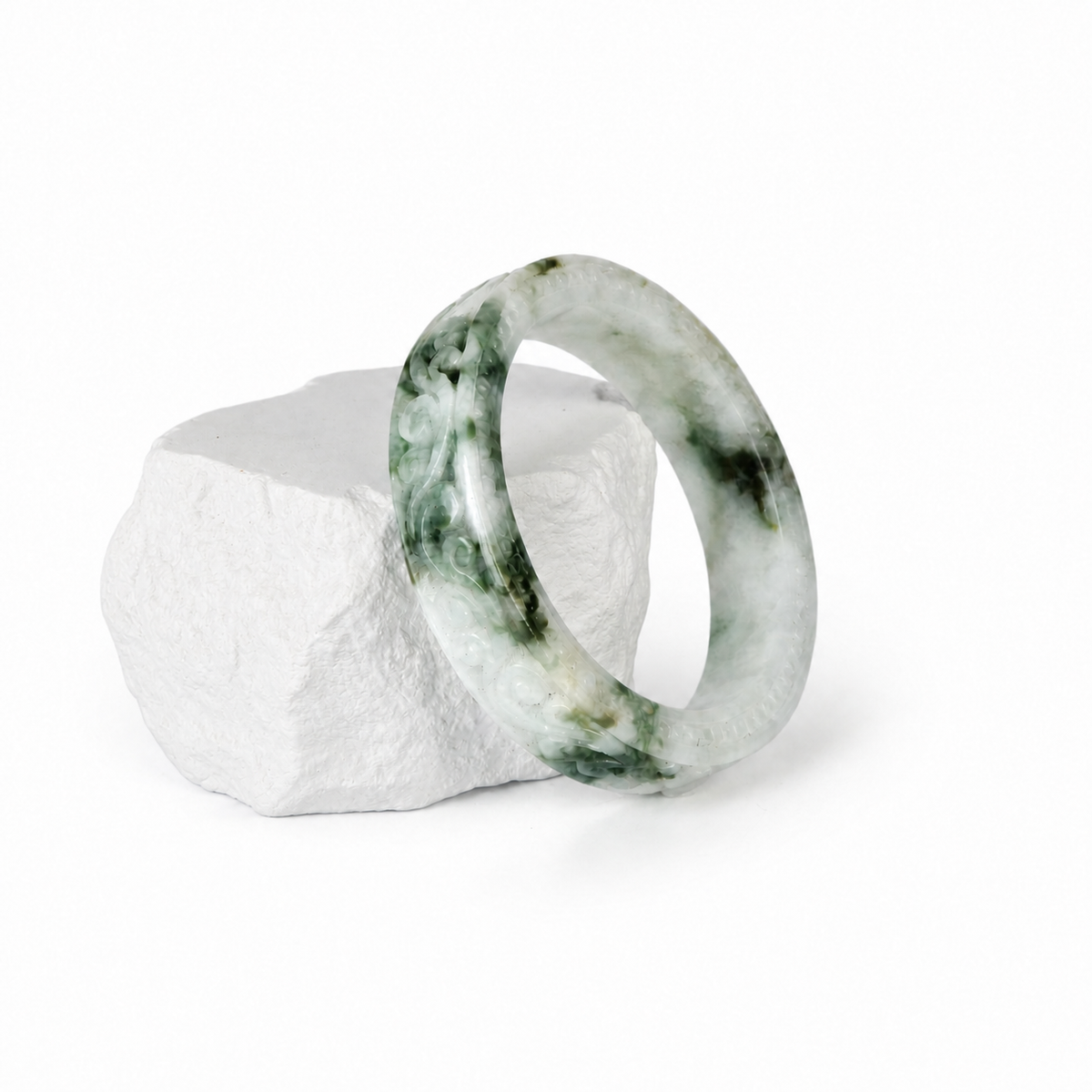 Hand-Carved Moss-in-Snow Jadeite Bangle, display view
