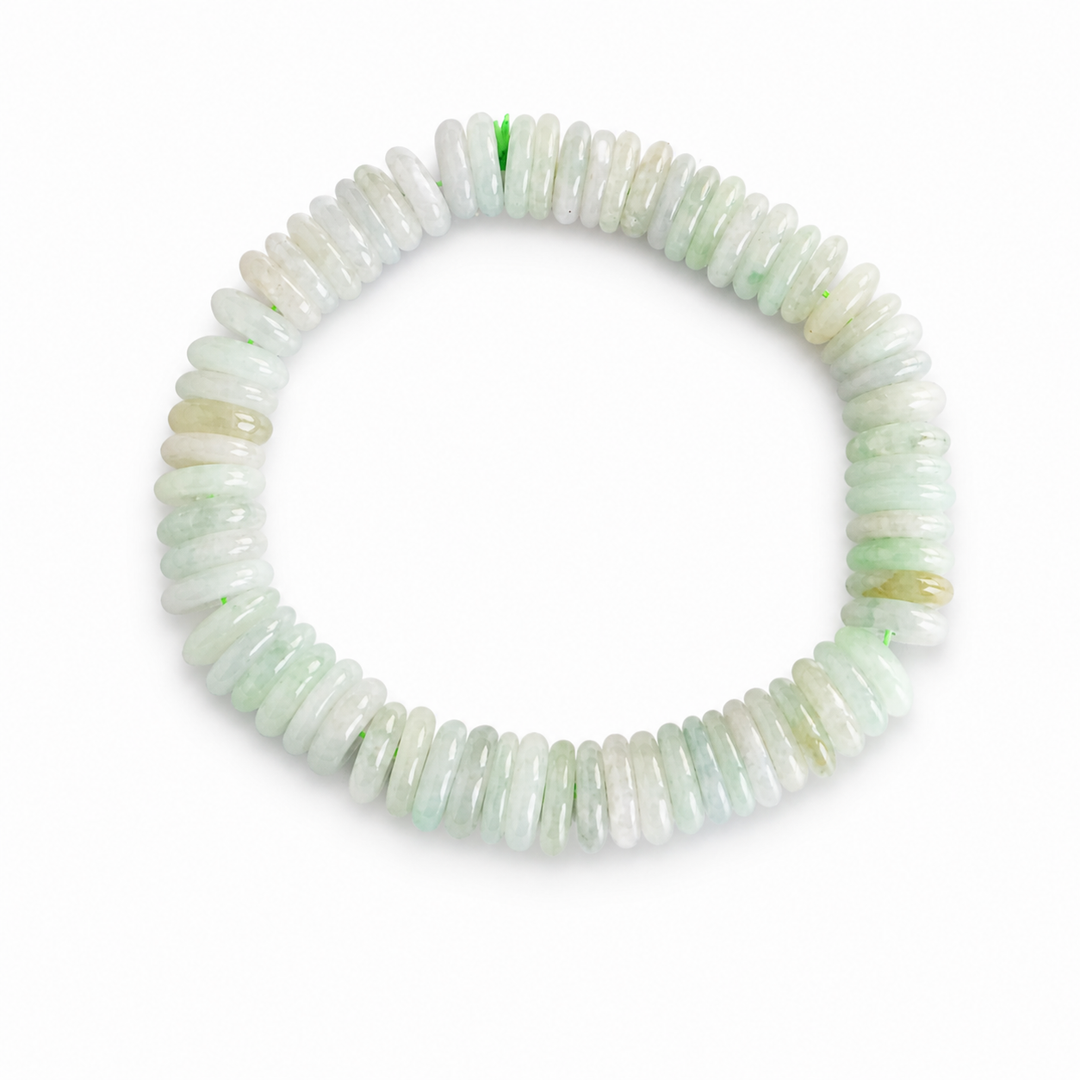 White and pale mint green Type A Jadeite rondelle stretch bracelet on a white background 