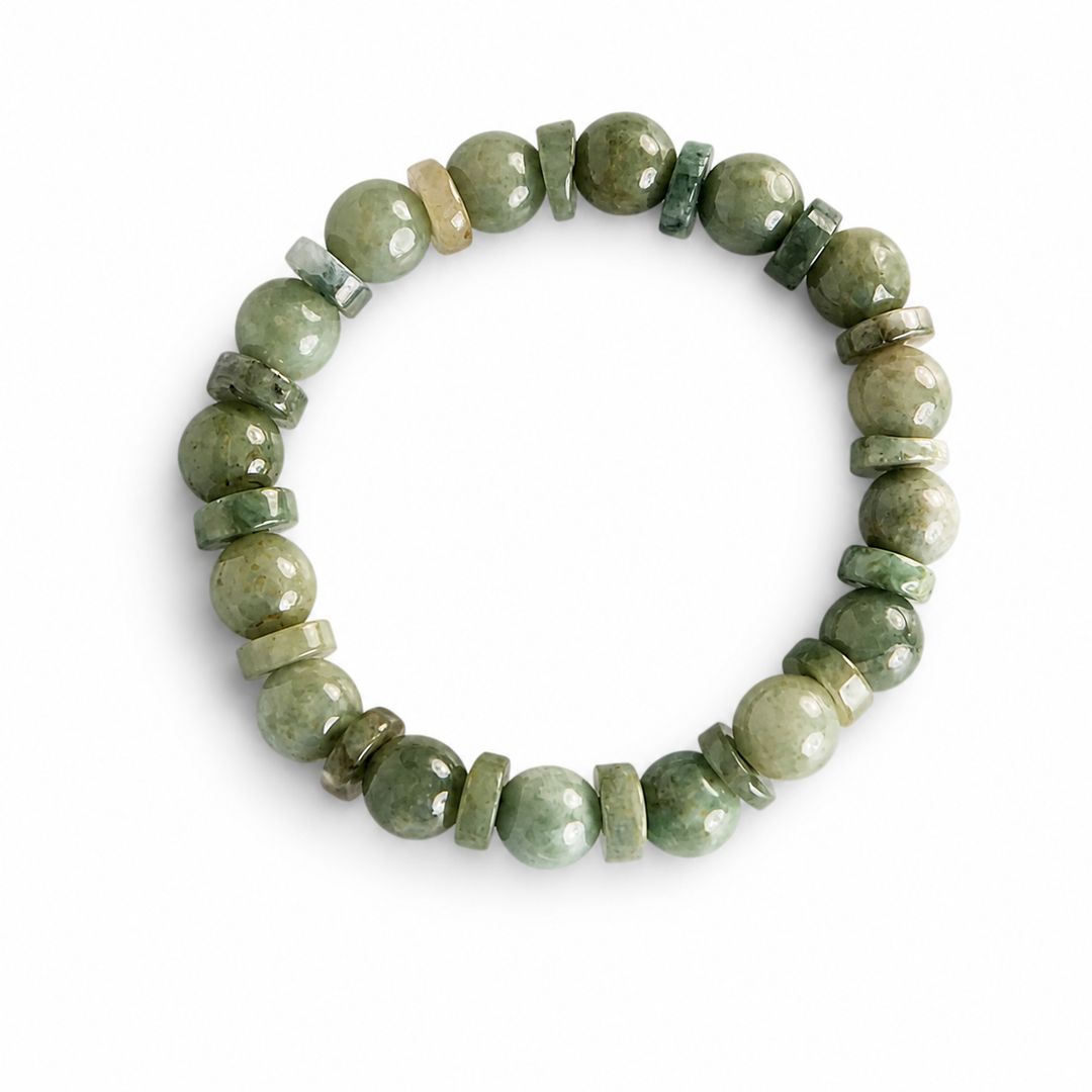 Green natural Type A Burmese Jadeite bead stretch bracelet on white